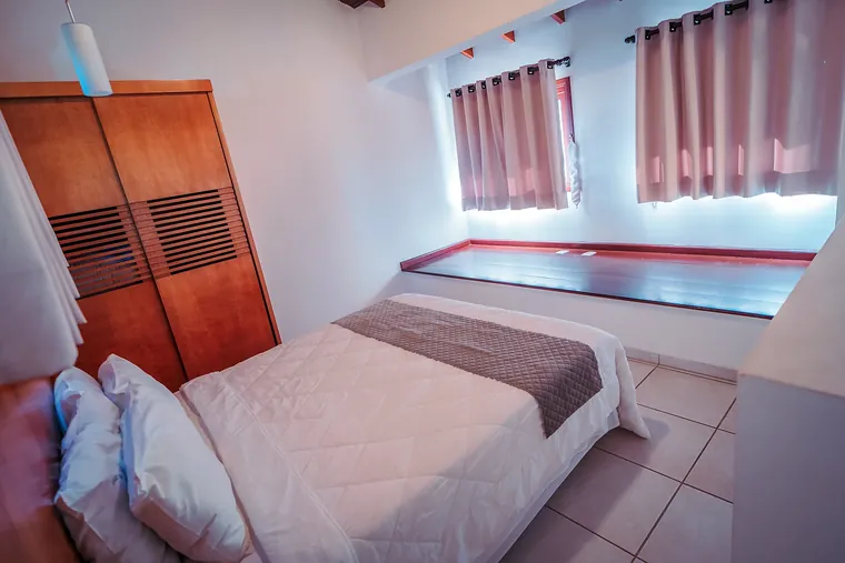 Quarto do piso superior do Estúdio Família